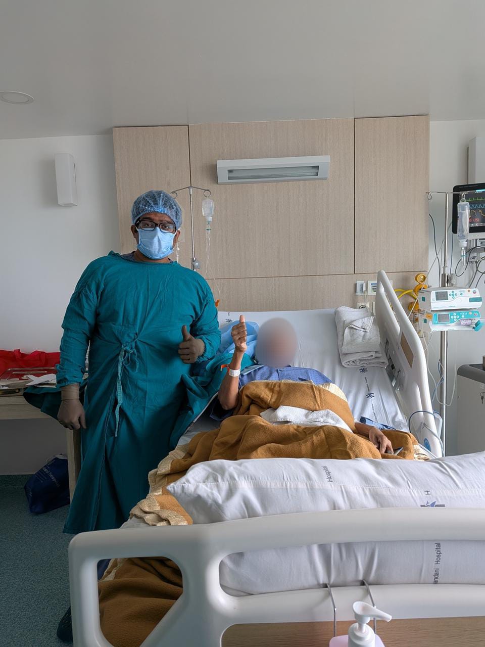Dr. Ashray Kole with patient