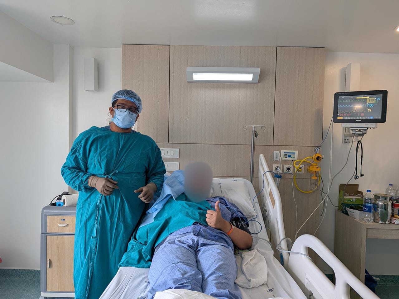 Dr. Ashray Kole with patient