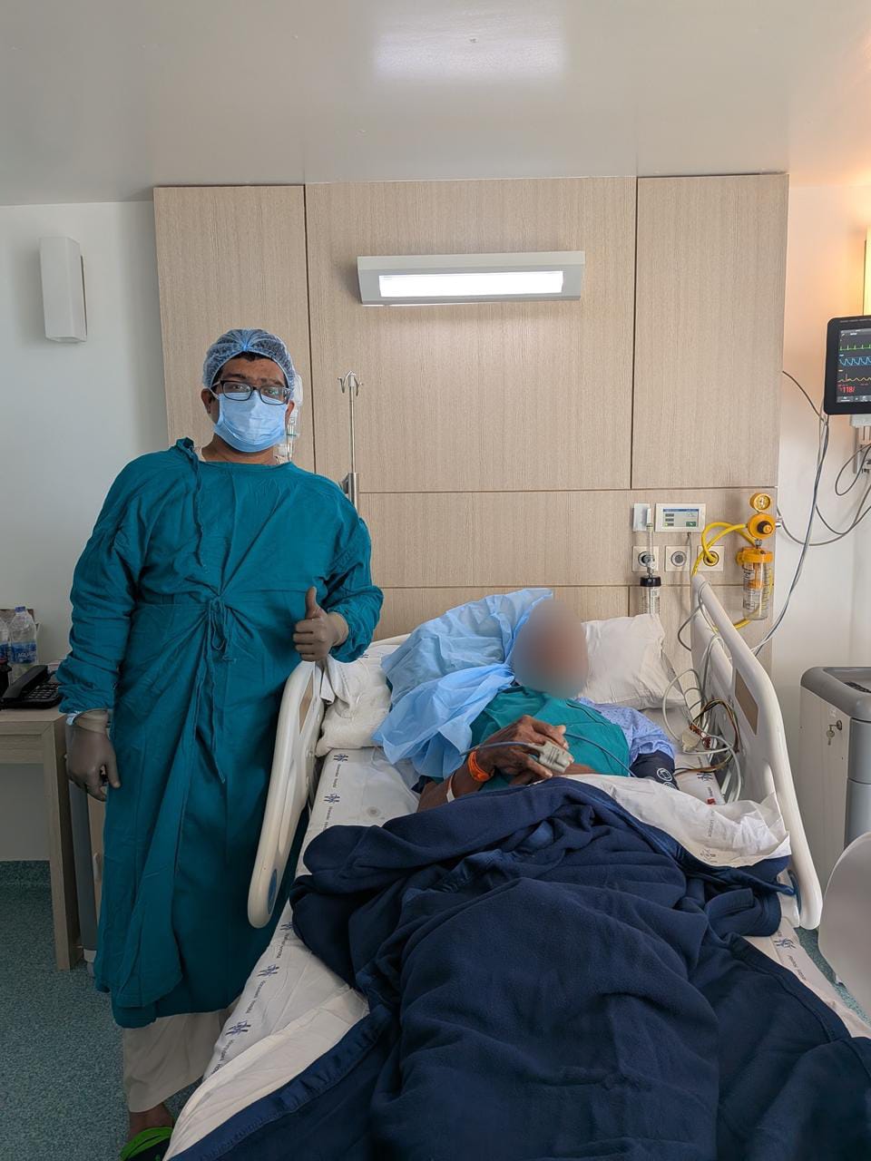Dr. Ashray Kole with patient