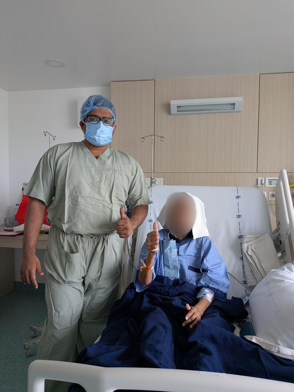 Dr. Ashray Kole with patient